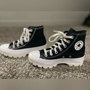 Black and white high top converse